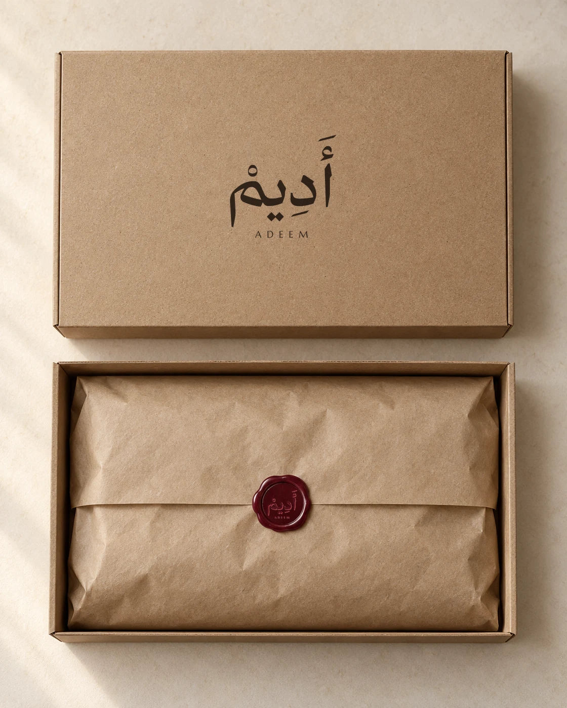 Illustration of ADEEM kraft-box packaging with stamped lid and wax-sealed kraft paper, based on the packaging description.