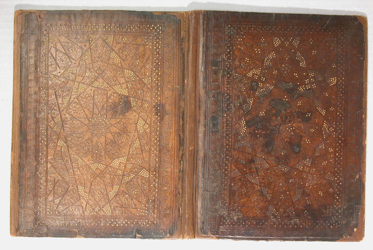 Two Mamluk leather book covers with interlacing geometric patterns and gilding